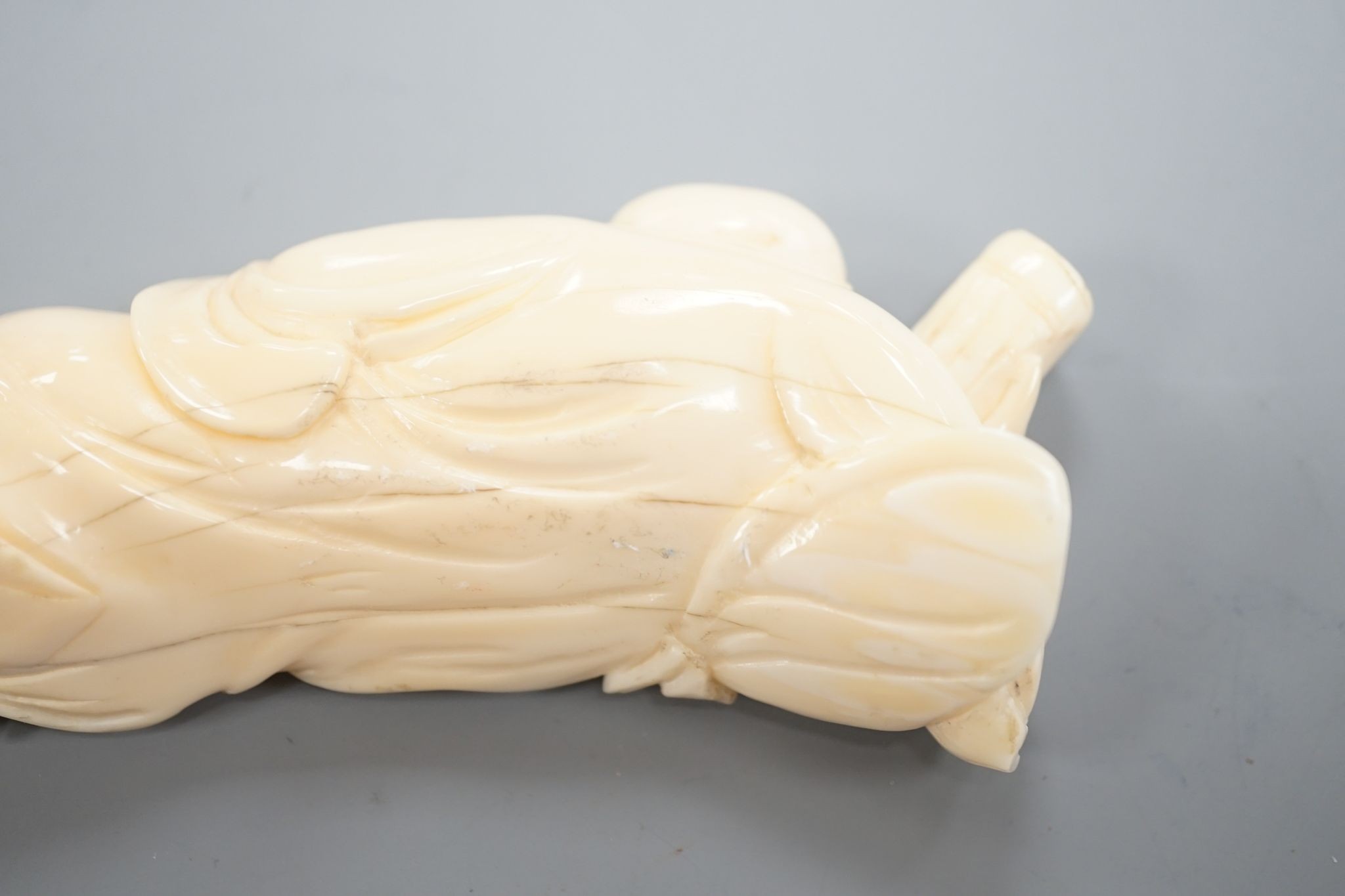A 19th century Chinese carved ivory figure of Budai 11cm